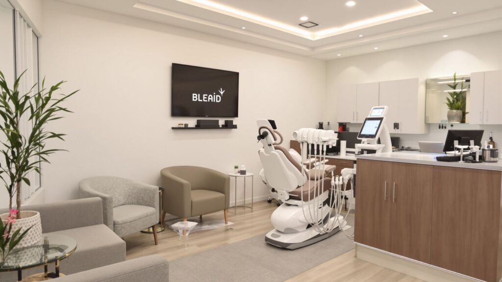 Modern clinic interior with treatment room and waiting area.